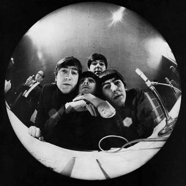 A photo of The Beatles. Photo credits: https://www.saturdayeveningpost.com/2013/12/beatlemania/beatles-bug-eye-camera/